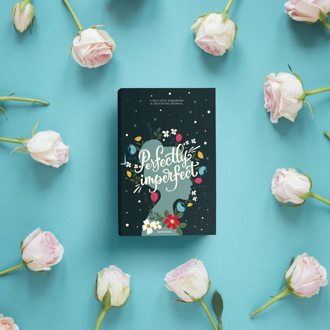 Perfectly Imperfect journal among pale roses